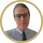 A portrait of Mark Phillips inside a circle